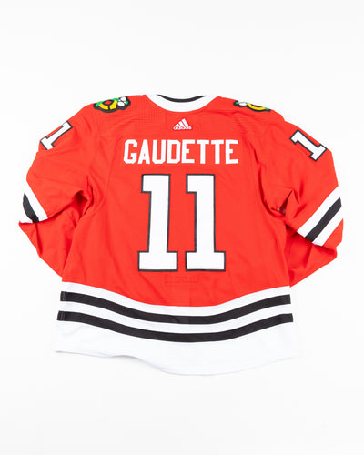 red home Chicago Blackhawks Adam Gaudette team issued jersey - back lay flat