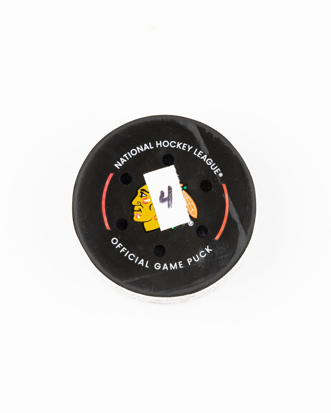 official Chicago Blackhawks hockey game used goal puck scored by Ryan Donato against the Edmonton Oilers on January 11, 2025 - front lay flat