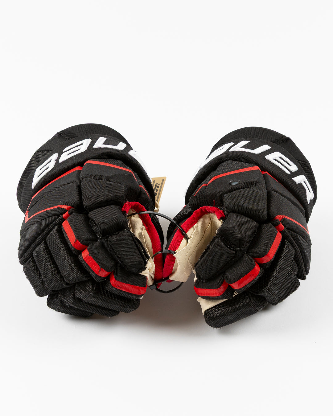 black Bauer hockey gloves game used and game worn by Chicago Blackhawks player Ilya Mikheyev - front lay flat