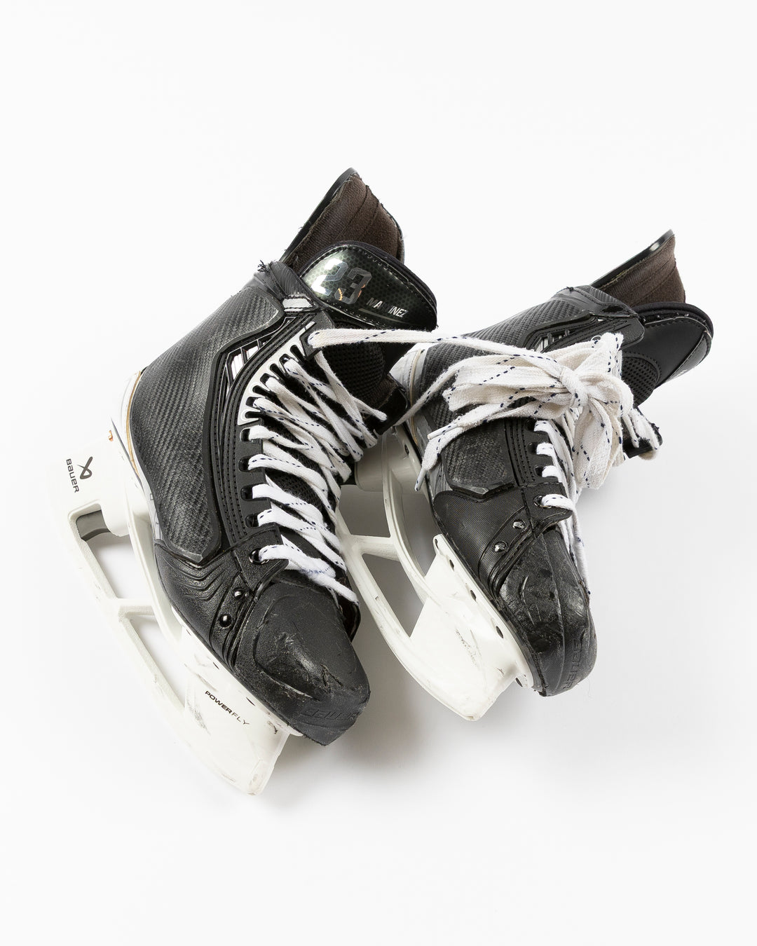 Bauer brand hockey skates game worn and used by Chicago Blackhawks player Alec Martinez - front lay flat