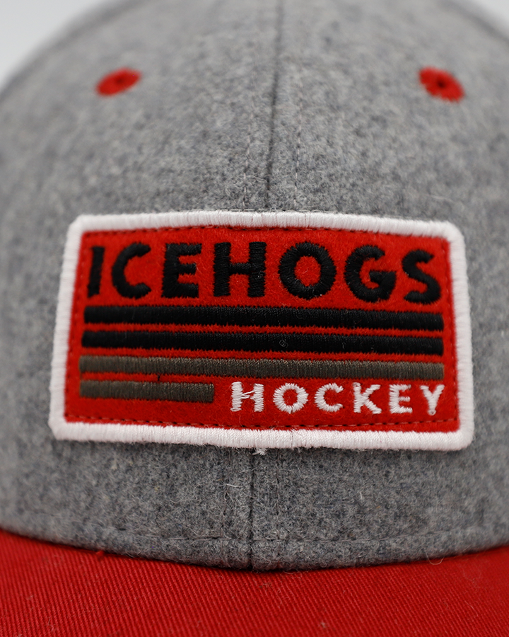 Legacy red and grey adjustable hat with IceHogs Hockey patch on front and Hammy Rockford IceHogs logo on right side - front detail lay flat
