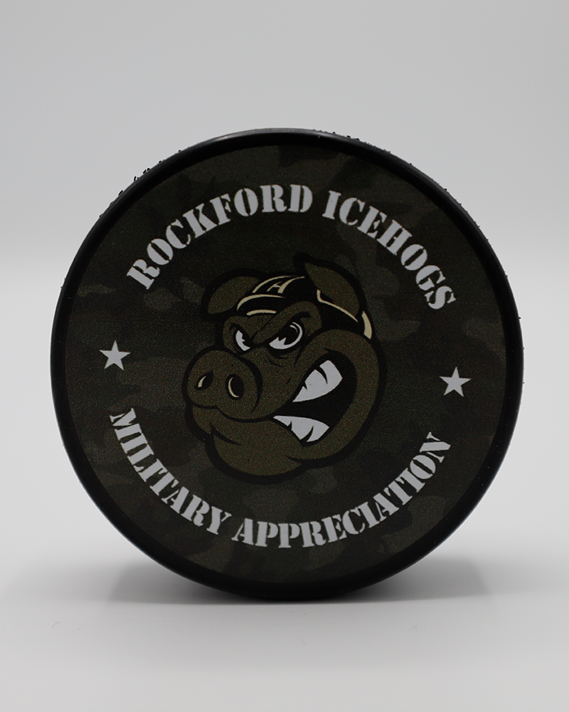 black Rockford IceHogs hockey puck with military-inspired graphic design on front - front lay flat