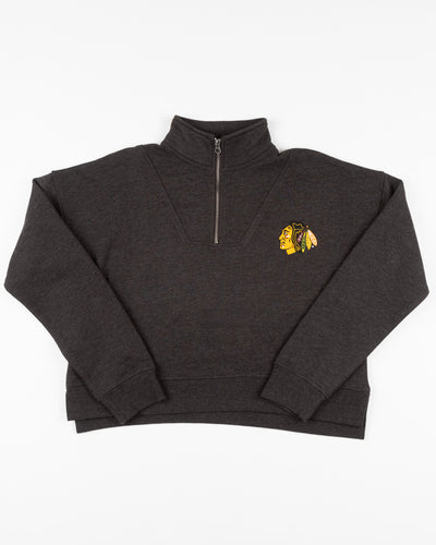 black chicka-d ladies quarter zip with Chicago Blackhawks primary logo printed on left chest - front lay flat