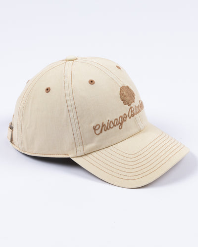 light brown '47 brand ladies cap with Chicago Blackhawks cursive wordmark and tonal primary logo on front - right angle lay flat