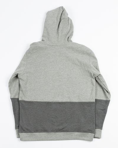 grey striped Champion hoodie with embroidered Chicago and Chicago Blackhawks primary logo on front - back lay flat