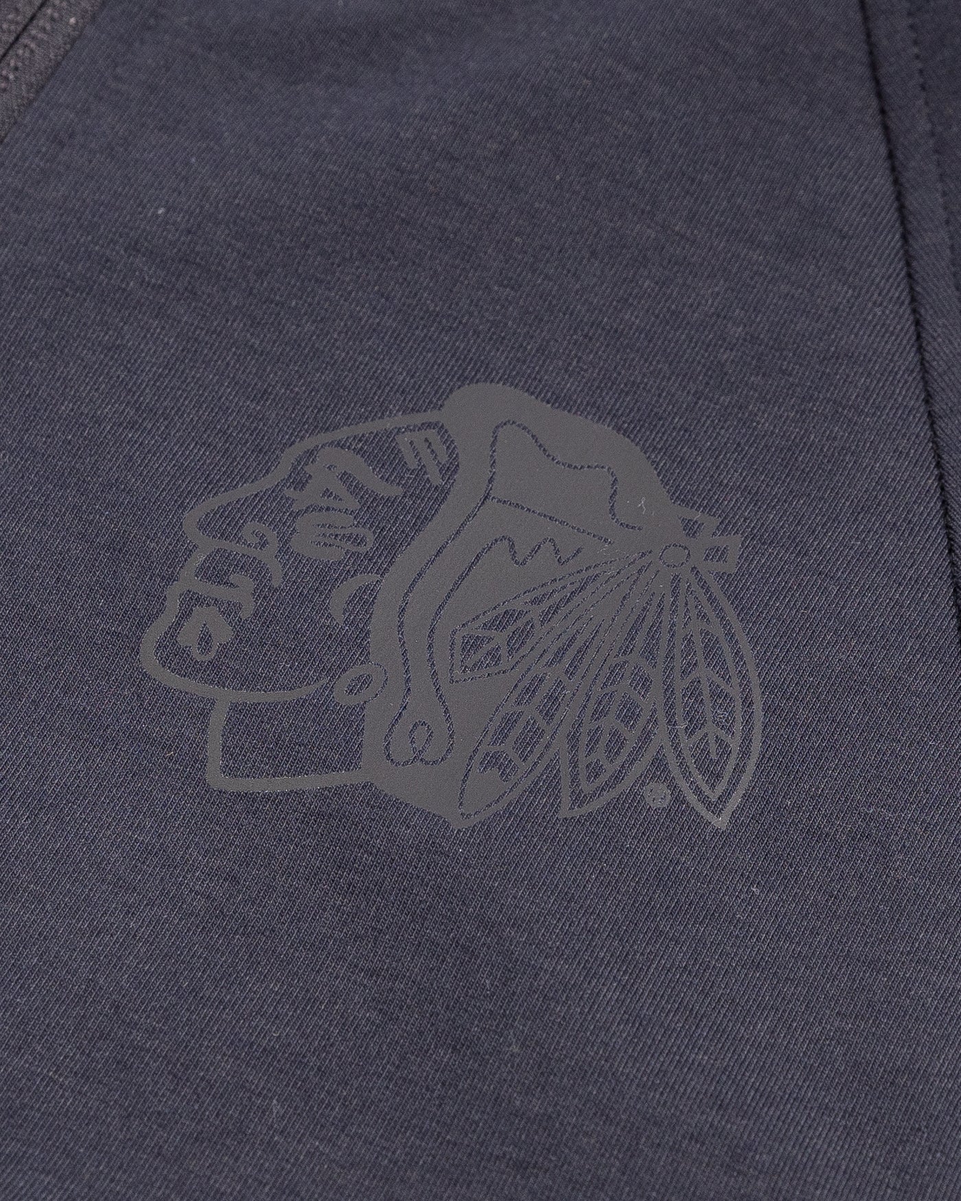 black lululemon full zip hoodie with tonal Chicago Blackhawks primary logo printed on left chest - detail lay flat