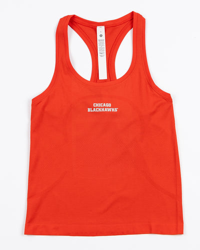 red lululemon women's tank with Chicago Blackhawks wordmark printed on front - front lay flat