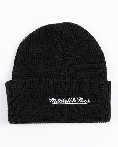 black Mitchell & Ness waffle knit beanie with Chicago Blackhawks wordmark tag adorning cuff - back lay flat