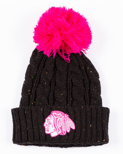 black youth knit beanie with pom with Chicago Blackhawks tonal pink primary logo embroidered on front - front lay flat