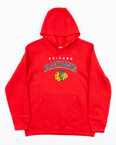 red youth Chicago Blackhawks hoodie with wordmark and primary logo - front lay flat