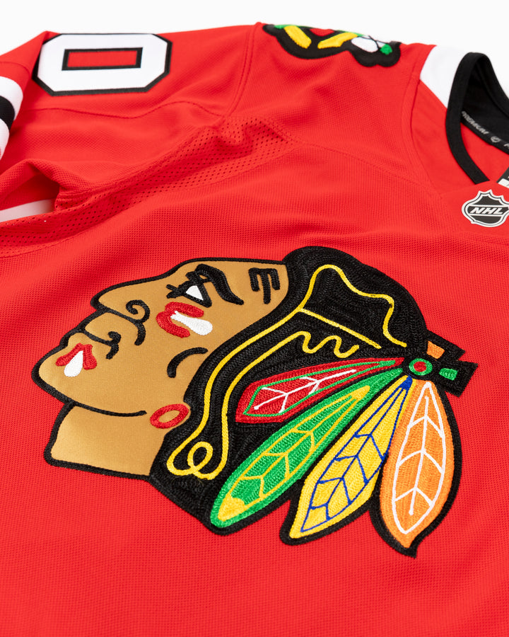 red Fanatics Premium Chicago Blackhawks Home Jersey with Spencer Knight name and number 30 - front detail lay flat