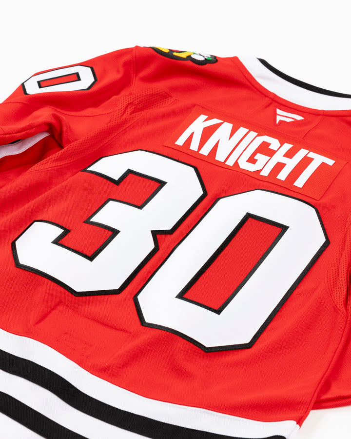 red Fanatics Premium Chicago Blackhawks Home Jersey with Spencer Knight name and number 30 - back detail lay flat