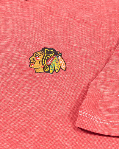 red Tommy Bahama polo with Chicago Blackhawks primary logo embroidered on left chest - detail logo lay flat