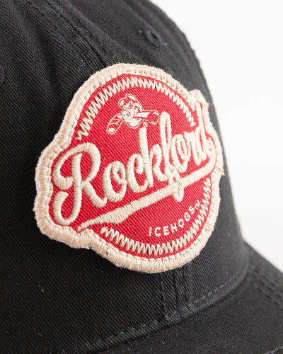 black Rockford IceHogs cap with embroidered red patch on front - detail lay flat