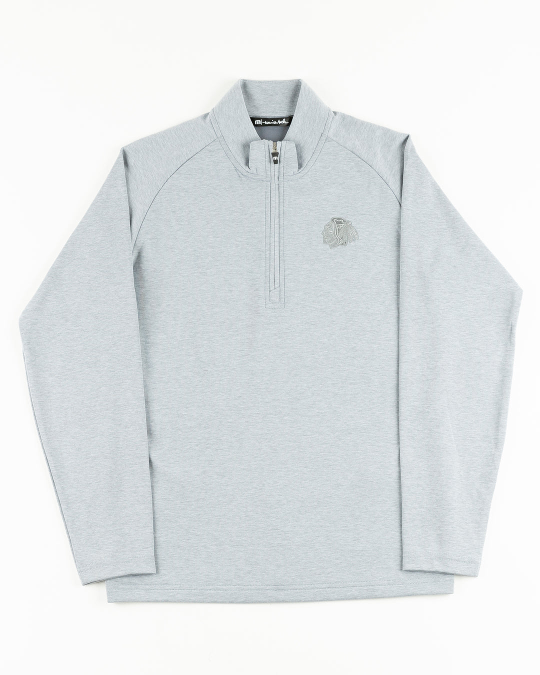 heather grey TravisMathew quarter zip with Chicago Blackhawks primary logo on left chest - front lay flat