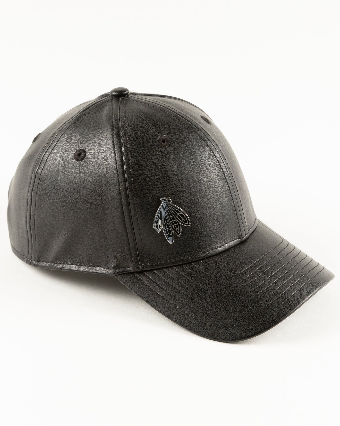 black leather New Era cap with Chicago Blackhawks four feathers logo in silver pin on front - right angle lay flat