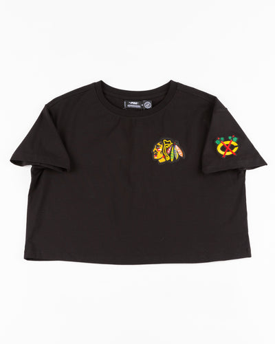 black cropped tee with embroidered Chicago Blackhawks patches on chest, shoulder and back - front lay flat