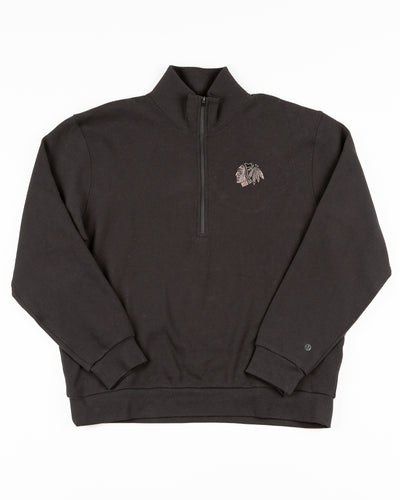 black lululemon half zip with tonal Chicago Blackhawks primary logo embroidered on left chest - front lay flat 