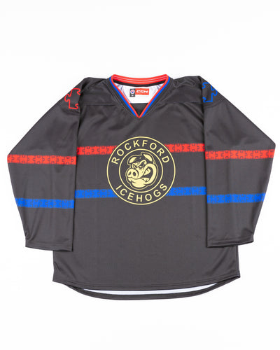 CCM black Autism Awareness jersey for the Rockford IceHogs - front lay flat
