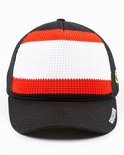 black Gongshow trucker hat with red and white stripe pattern and Chicago Blackhawks secondary logo embroidered on left side - front lay flat