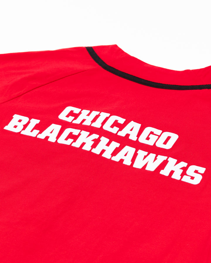 red Mitchell & Ness baseball-inspired button shirt with Chicago Blackhawks primary logo embroidered on left chest - back detail lay flat