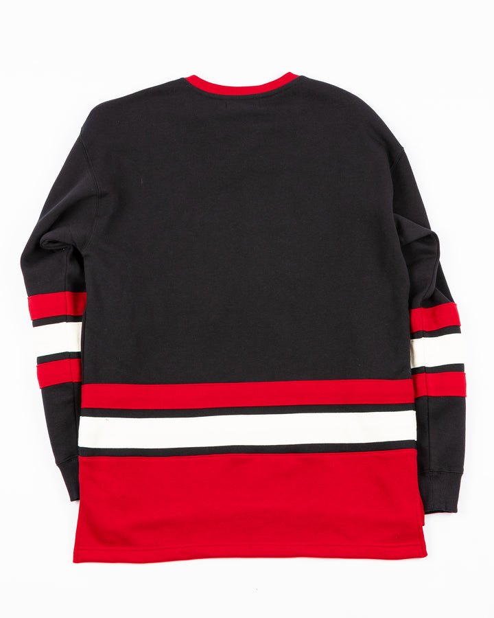 black red and white Mitchell & Ness hockey jersey inspired crewneck with lace detail and Chicago Blackhawks primary logo on front, NHL Western Conference on right shoulder and secondary logo on left shoulder - back lay flat