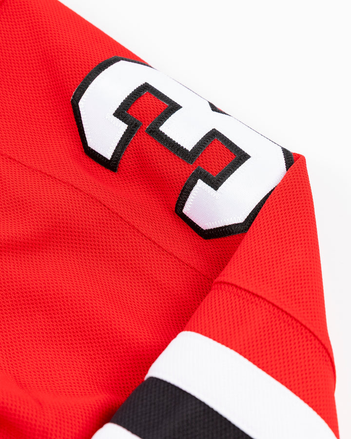 premium Fanatcs home Chicago Blackhawks jersey with Ethan Del Mastro name and number - shoulder detail lay flat