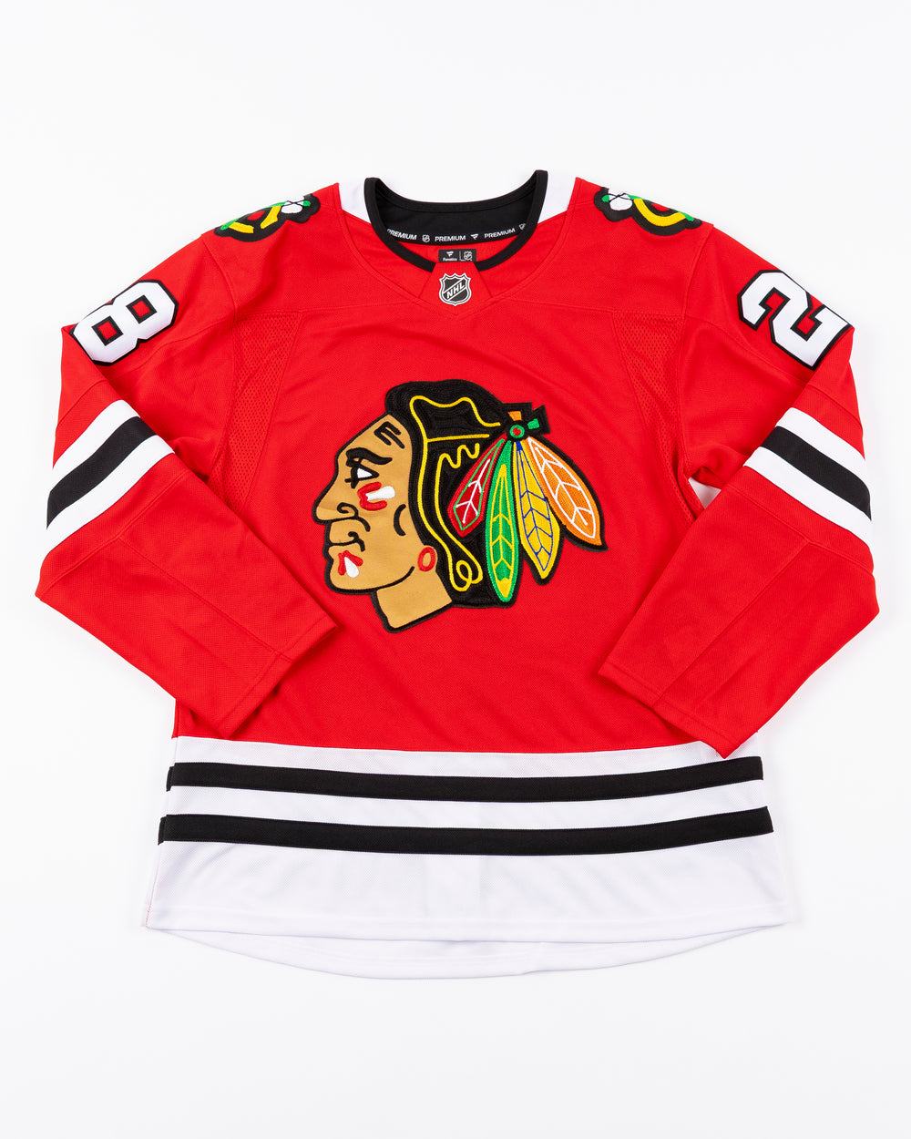 premium Fanatcs home Chicago Blackhawks jersey with Colton Dach name and number - front lay flat