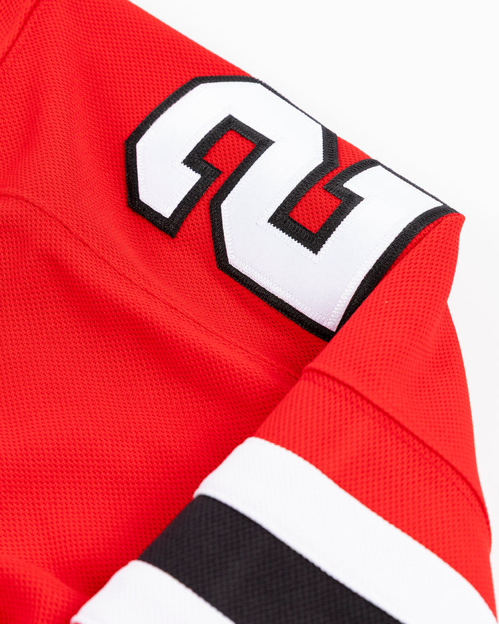premium Fanatcs home Chicago Blackhawks jersey with Colton Dach name and number - shoulder detail lay flat