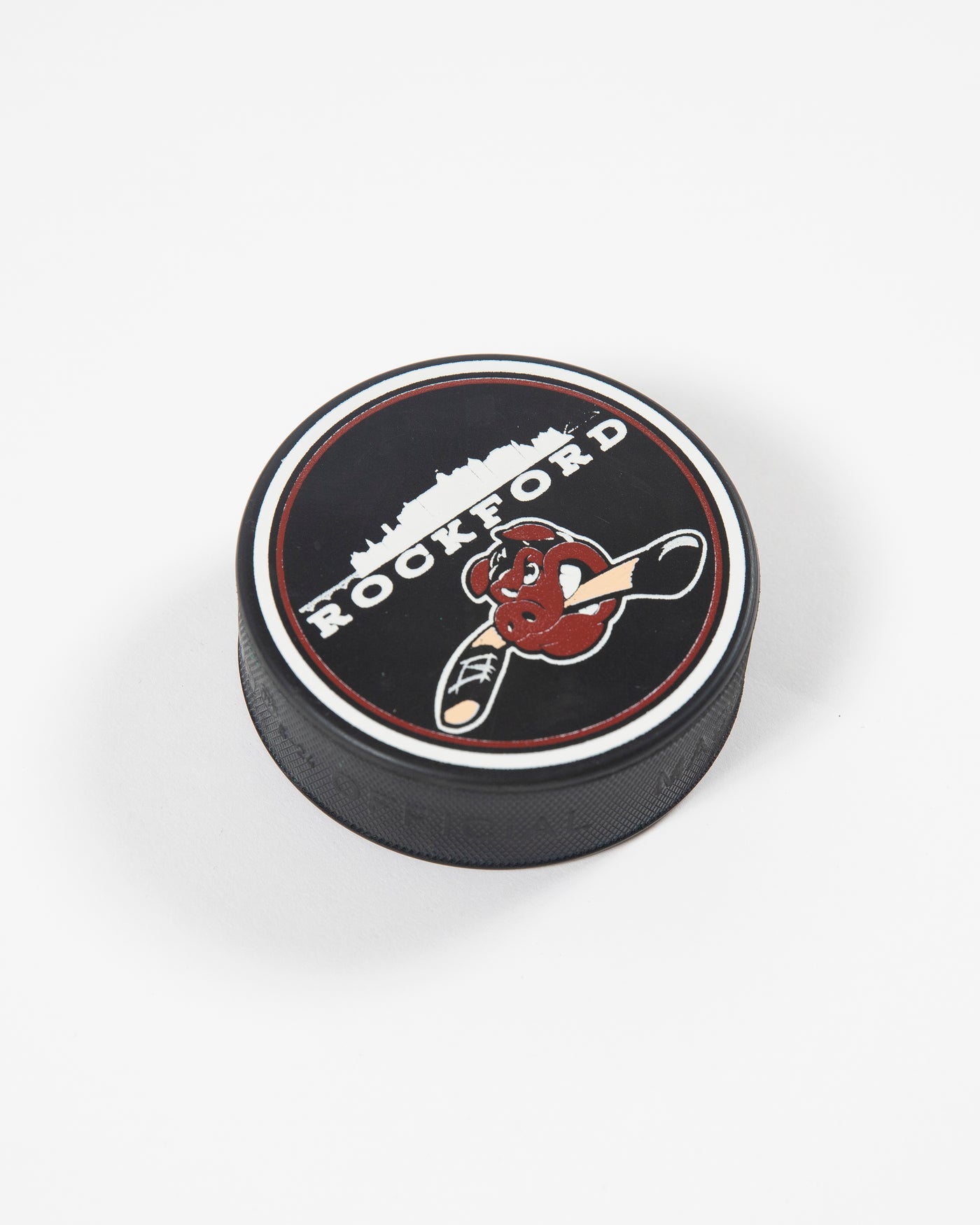 Black Rockford IceHogs hockey puck with skyline graphic - angled lay flat