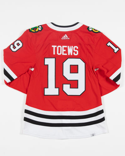 adidas authentic red home Toews 19 Chicago Blackhawks jersey - back lay flat