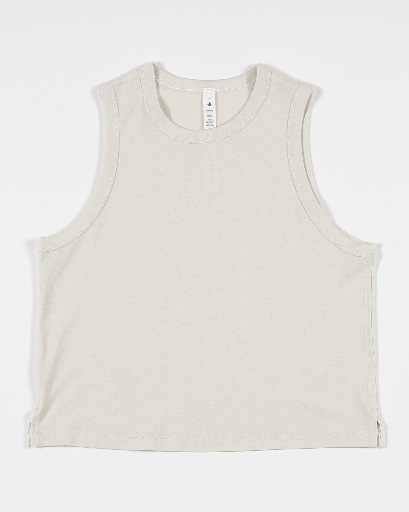 off white lululemon tank top with Chicago Blackhawks primary logo on back - front lay flat