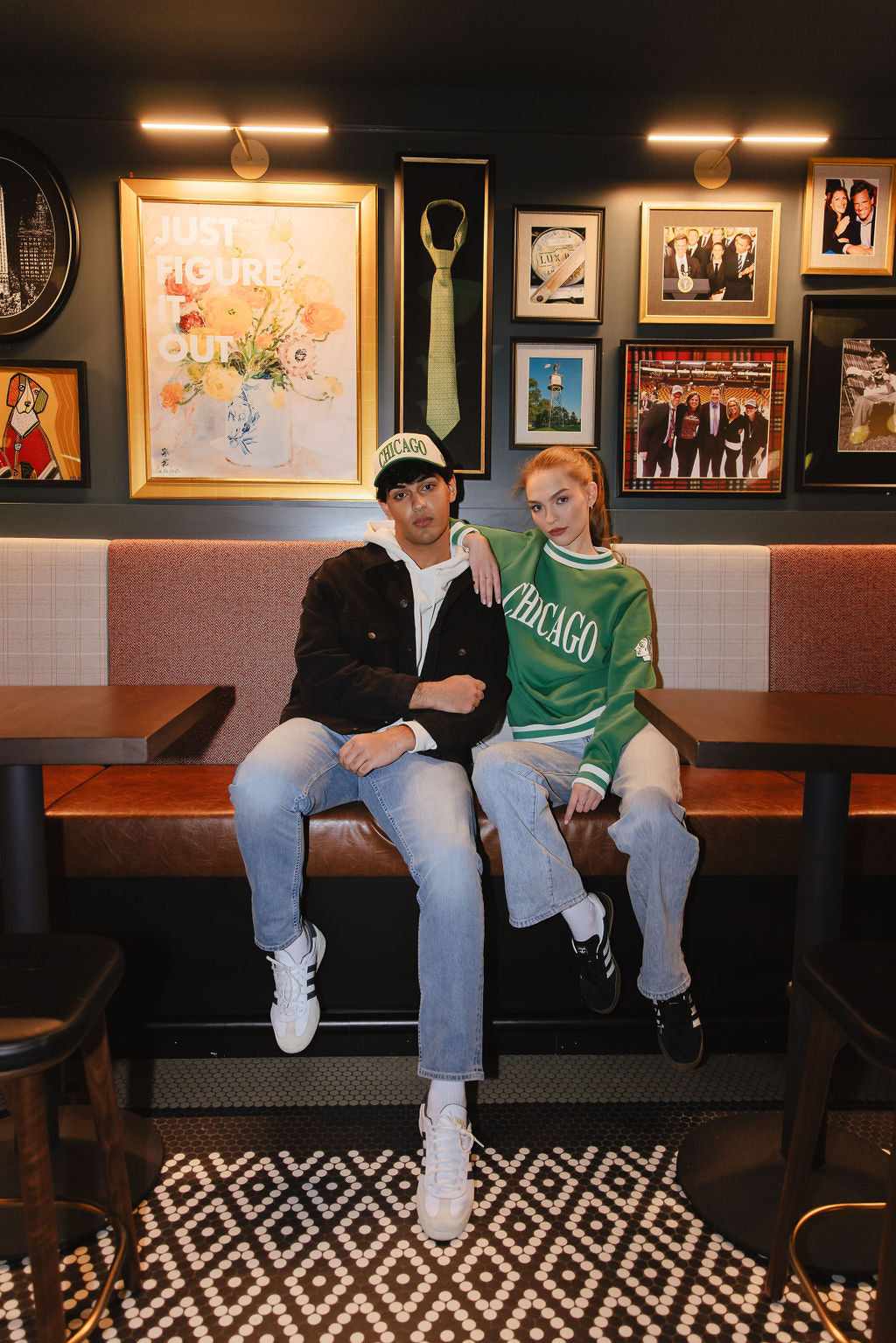 man wearing cream and green Alice & Wonder hat with Chicago wordmark on front and Chicago Blackhawks primary logo on left side