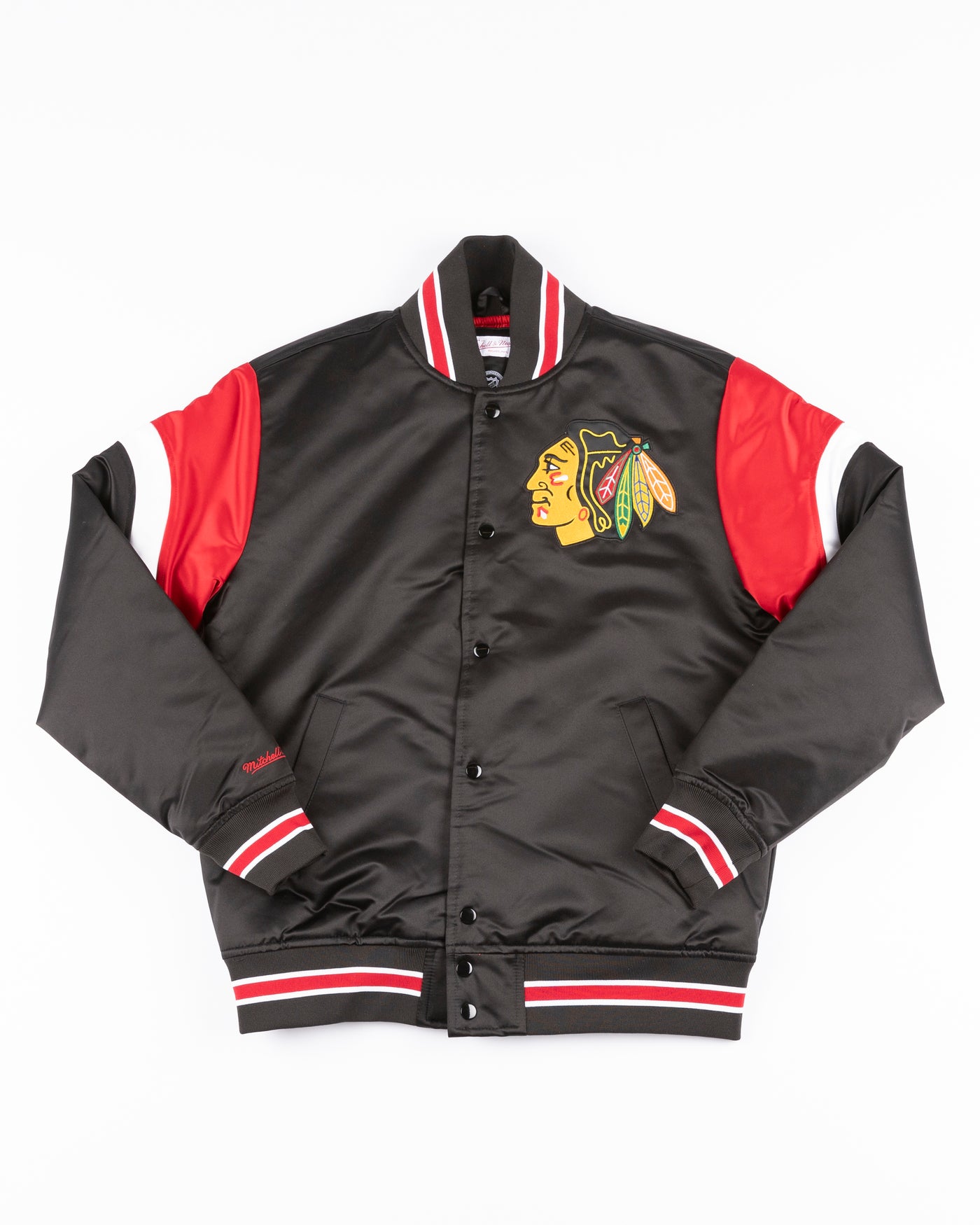 black Mitchell & Ness satin varsity jacket with Chicago Blackhawks primary logo on left chest and wordmark on back yoke - front lay flat