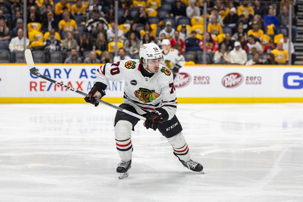 Chicago Blackhawks player Cole Gutman in white adidas away jersey 