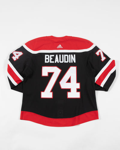 Autographed Chicago Blackhawks Nicolas Beaudin team issued reverse retro jersey - back angle