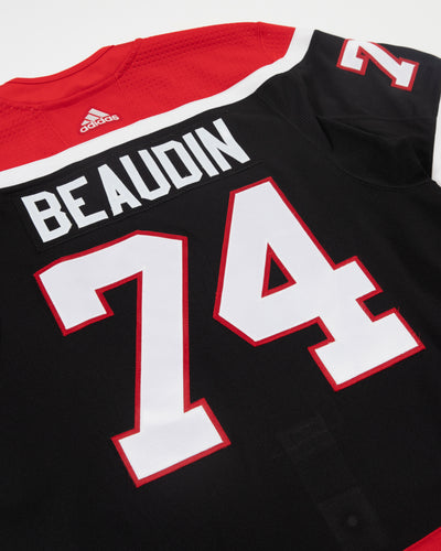 Autographed Chicago Blackhawks Nicolas Beaudin team issued reverse retro jersey - close up back angle
