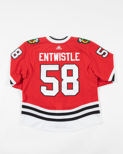 Autographed Chicago Blackhawks Mackenzie Entwistle team issued red jersey - back angle