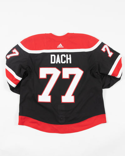 Autographed Chicago Blackhawks Kirby Dach team issued reverse retro jersey - back angle