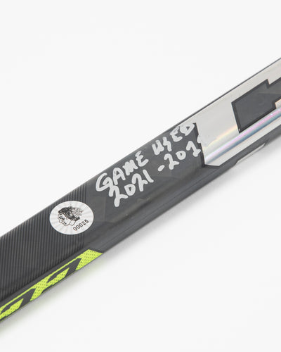 Autographed Chicago Blackhawks Seth Jones game used hockey stick - close up on hologram sticker