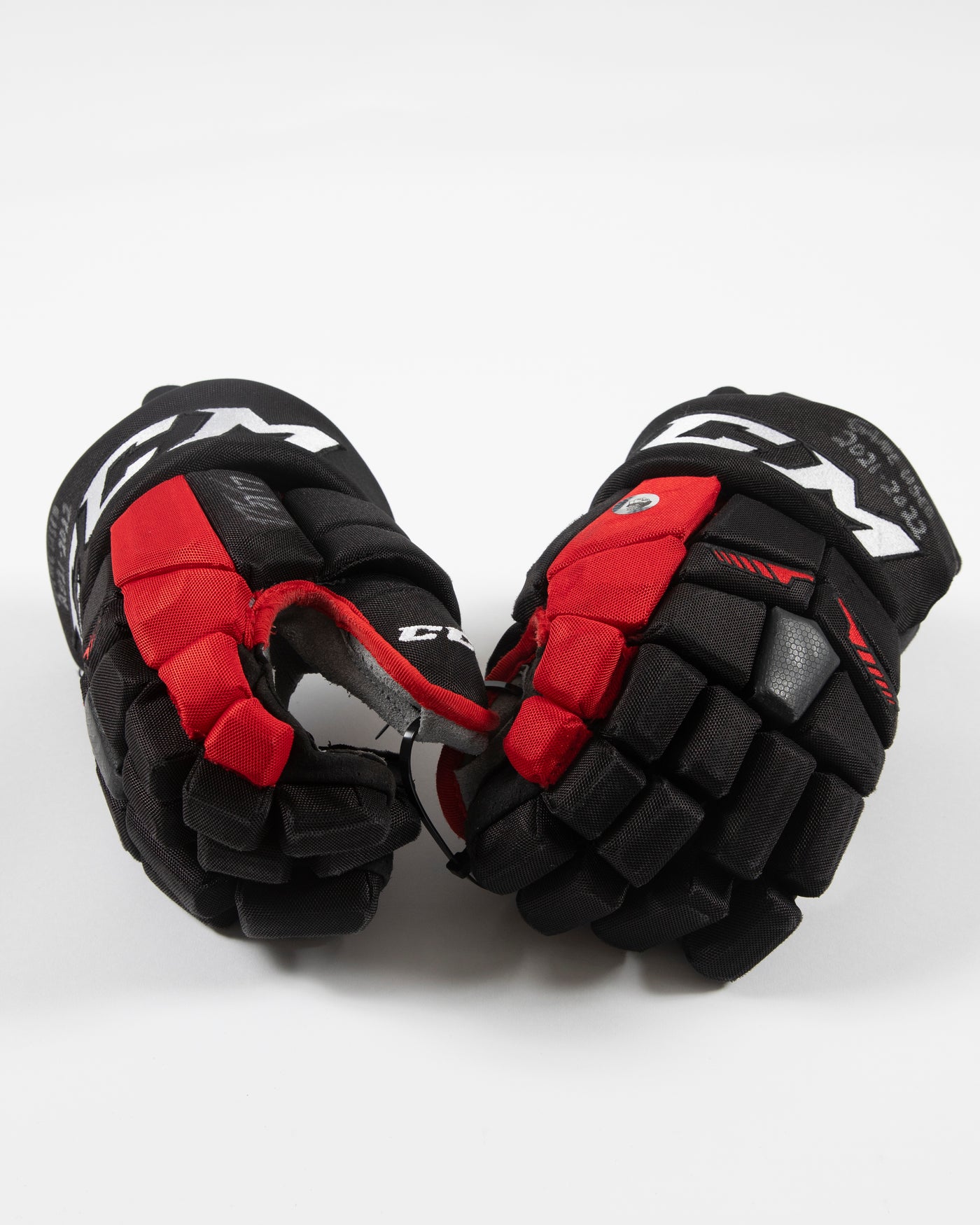 Autographed Chicago Blackhawks CCM Dylan Strome game used hockey gloves - both gloves