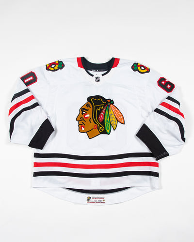 Autographed Chicago Blackhawks Collin Delia team issued white jersey - front angle