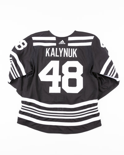 team issued Chicago Blackhawks Reverse Retro jersey of Wyatt Kalynuk - back lay flat