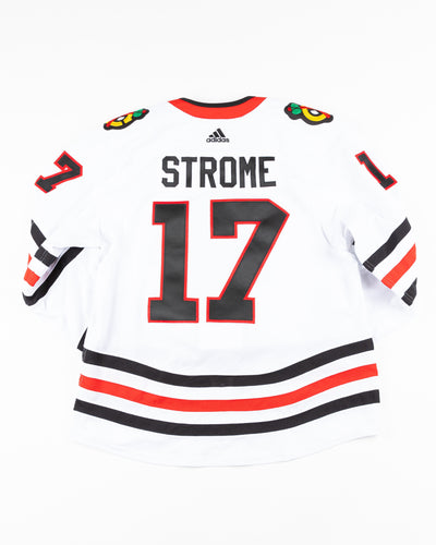 Dylan Strome white Chicago Blackhawks team issued away jersey - back lay flat 