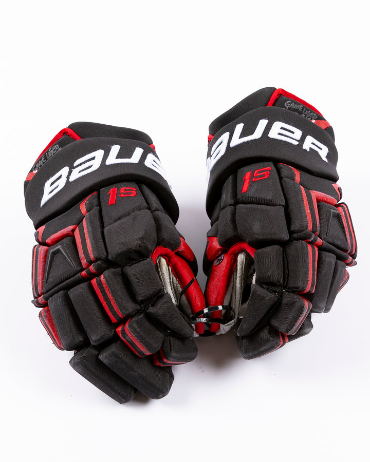 signed game-used Bauer hockey gloves from Chicago Blackhawks Connor Murphy - front lay flat