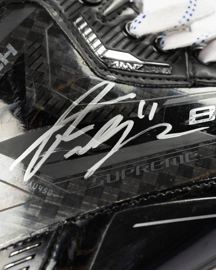 signed game-used Bauer hockey skates from Chicago Blackhawks Taylor Raddysh - autograph detail lay flat