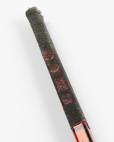 signed game-used Bauer hockey stick from Chicago Blackhawks Nikita Zaitsev - alt detail stick lay flat