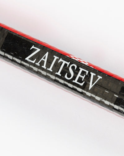 signed game-used Bauer hockey stick from Chicago Blackhawks Nikita Zaitsev - detail stick lay flat