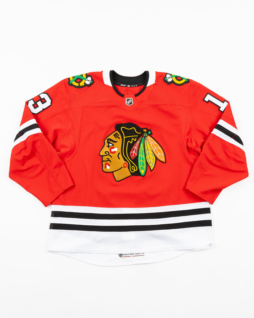 red team issued Chicago Blackhawks jersey with Mattias Janmark name and number - front lay flat