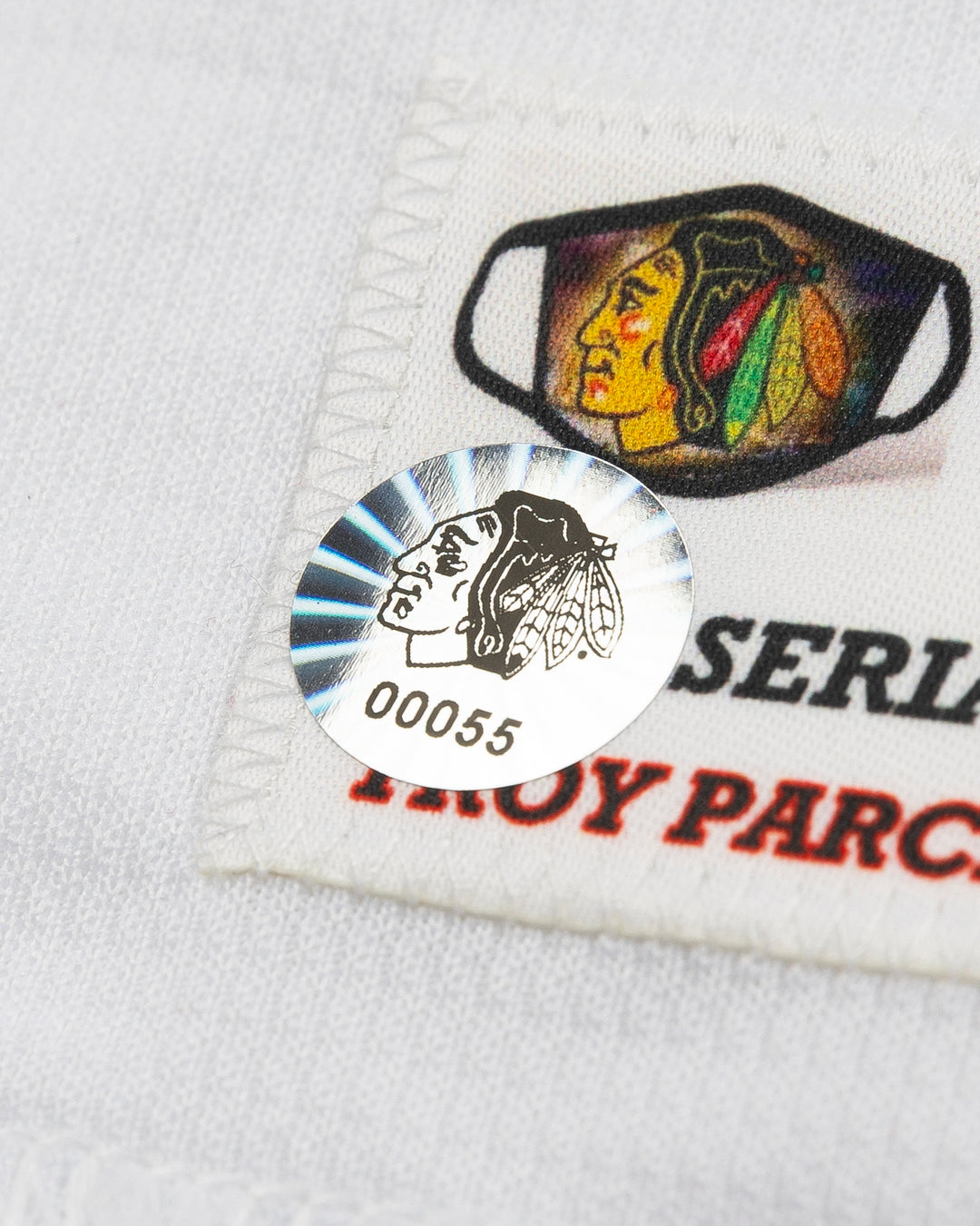 red team issued Chicago Blackhawks jersey with Mattias Janmark name and number - hologram sticker detail lay flat